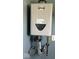 Close-up shot of the tankless water heater unit at 1824 Spann Ave, Indianapolis, IN 46203