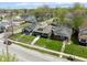 Charming homes showcasing neat lawns and mature trees, enhancing curb appeal and neighborhood charm at 1835 N Rural St, Indianapolis, IN 46218
