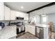Well-appointed kitchen with stainless steel appliances and granite countertops at 1835 N Rural St, Indianapolis, IN 46218