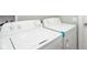 Laundry room with a white washing machine and dryer showcasing modern appliances at 1835 N Rural St, Indianapolis, IN 46218