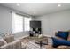 Cozy living room with modern decor and plush seating arrangements at 1835 N Rural St, Indianapolis, IN 46218