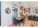 Bright dining area features an eye-catching mirror and a wood table with seating for four at 1907 N Alabama St, Indianapolis, IN 46202