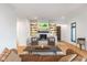 Spacious living room with custom built-ins, a cozy fireplace, and stylish decor creating an inviting atmosphere at 1907 N Alabama St, Indianapolis, IN 46202