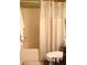 Bright bathroom featuring a shower with a clean white curtain and a modern toilet for comfortable living at 2120 Dakota Dr, Franklin, IN 46131