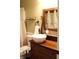 Charming bathroom featuring a vintage vanity, vessel sink, and decorative mirror with a rustic wood frame at 2120 Dakota Dr, Franklin, IN 46131