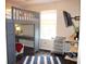Bedroom with a unique loft bed and a desk area at 2120 Dakota Dr, Franklin, IN 46131