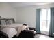 Bright bedroom with a window, chair and comfortable bed at 2120 Dakota Dr, Franklin, IN 46131