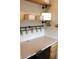 Functional desk area with shelving and hanging buckets, providing an organized and stylish workspace at 2120 Dakota Dr, Franklin, IN 46131