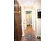 Hallway with a decorative rug and storage cabinets and access to other rooms at 2120 Dakota Dr, Franklin, IN 46131