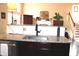 Modern kitchen with a large sink, stainless steel appliances, and granite countertops at 2120 Dakota Dr, Franklin, IN 46131