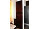 Pantry and fridge with dark cabinetry and modern stainless steel refrigerator at 2120 Dakota Dr, Franklin, IN 46131