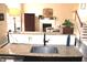 Open concept kitchen with granite countertops, island seating, and easy access to living spaces at 2120 Dakota Dr, Franklin, IN 46131