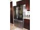 Kitchen features a stainless steel refrigerator and granite countertops at 2120 Dakota Dr, Franklin, IN 46131