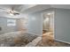 Room with fan and a bathroom at 219 S Sherman Dr, Indianapolis, IN 46201