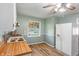 Functional kitchen with ample counter space, a refrigerator, and laminate flooring at 219 S Sherman Dr, Indianapolis, IN 46201