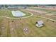 Aerial community view of pond, greenspace, walking path, gazebo, and fire pit at 2257 Aviary Ln, Danville, IN 46122