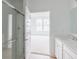 Well-lit bathroom featuring modern fixtures, including a shower and a single sink vanity at 2257 Aviary Ln, Danville, IN 46122