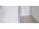 Small walk in closet with carpet at 2257 Aviary Ln, Danville, IN 46122