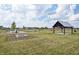A community space with a fire pit, gazebo, and pond with beautiful landscaping creating a vibrant atmosphere at 2257 Aviary Ln, Danville, IN 46122