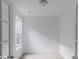 Bright flex room featuring neutral carpeting, white walls, and natural light streaming through the window at 2257 Aviary Ln, Danville, IN 46122
