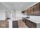 Bright kitchen with stainless steel appliances, white countertops, and an island with bar seating at 2257 Aviary Ln, Danville, IN 46122