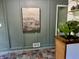 Stylish hallway features neutral paint, accent decor, and colorful floor tiling at 2325 Melody Ln, Anderson, IN 46012