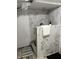 Contemporary shower with elegant tile work, a modern fixture, and a built-in shelf at 2325 Melody Ln, Anderson, IN 46012