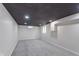 Finished basement with recessed lighting and light gray carpet offers a clean, versatile space at 2539 E 68Th St, Indianapolis, IN 46220