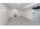 Finished basement area features neutral carpet, recessed lighting, and bathroom access at 2539 E 68Th St, Indianapolis, IN 46220