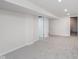 Finished basement has light gray carpet and white walls, offering a flexible living space at 2539 E 68Th St, Indianapolis, IN 46220