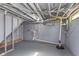 Unfinished basement showing utilities and concrete walls, ready for customization at 2539 E 68Th St, Indianapolis, IN 46220
