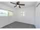 Bright bedroom featuring carpet, dual windows, and neutral paint at 2539 E 68Th St, Indianapolis, IN 46220