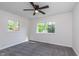 Bright bedroom featuring carpet, dual windows, and neutral paint at 2539 E 68Th St, Indianapolis, IN 46220