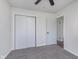 Bedroom featuring carpet, closet, and neutral paint at 2539 E 68Th St, Indianapolis, IN 46220