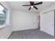 Bedroom featuring carpet, one window, closet, and neutral paint at 2539 E 68Th St, Indianapolis, IN 46220