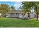 Charming single-story home with a well-maintained lawn and lovely curb appeal at 2539 E 68Th St, Indianapolis, IN 46220
