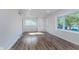 Bright living room featuring new floors, neutral paint, and modern recessed lighting at 2539 E 68Th St, Indianapolis, IN 46220