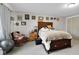 Comfortable bedroom featuring a wooden bed frame and cozy decor, with plenty of natural light at 2610 S Sheridan Ave, Indianapolis, IN 46203