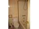 Standard bath/shower combo with a tile surround, sink, and toilet at 3510 Maura Ct, Indianapolis, IN 46235