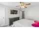 Neutral bedroom featuring a mounted TV and closet space at 3582 Fieldhurst Ln, Plainfield, IN 46168