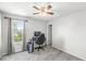 Simple bedroom with a large window and a gaming setup at 3582 Fieldhurst Ln, Plainfield, IN 46168