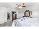 Bedroom boasts a ceiling fan, soft carpet, and closet for plenty of storage at 3582 Fieldhurst Ln, Plainfield, IN 46168