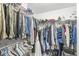 Walk-in closet with ample hanging space and storage for clothes, shoes, and accessories at 3582 Fieldhurst Ln, Plainfield, IN 46168