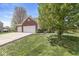 Beautiful home exterior with well-manicured lawn and a spacious driveway leading to a three-car garage at 3582 Fieldhurst Ln, Plainfield, IN 46168