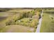 Lush acreage surrounds this cozy home with a detached outbuilding at 3913 E Cr 600 S, Clayton, IN 46118