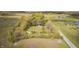 Land parcel with home, outbuilding, road frontage and mature trees at 3913 E Cr 600 S, Clayton, IN 46118