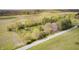 Aerial view of a home on acreage, bordering farm land and paved road at 3913 E Cr 600 S, Clayton, IN 46118