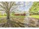 Charming single-story brick home with a large yard and mature trees at 3913 E Cr 600 S, Clayton, IN 46118