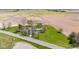 Expansive aerial view of a beautiful property nestled between green lawn and farmland at 4155 S State Rd 39, Lebanon, IN 46052