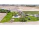 Beautiful aerial view of a sprawling property surrounded by lush greenery and farmland at 4155 S State Rd 39, Lebanon, IN 46052